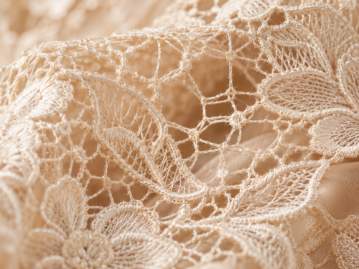 Open lace mesh with visible connections between individual thread motifs